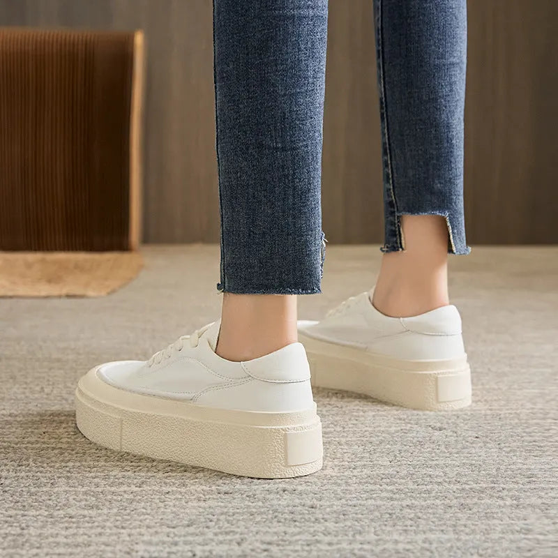 Women's black platform casual sports board shoes with tied design and round toe