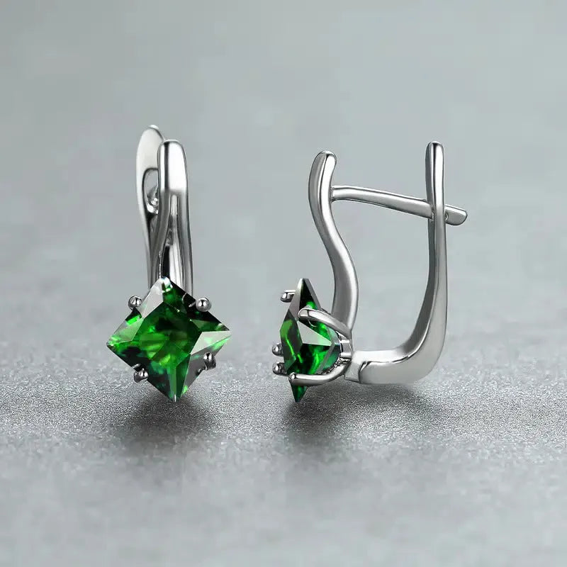 Copper diamond design earrings with inlaid zircon stones in blue, green, and colour options.