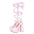 Pink chunky heel lace-up platform pumps with thick heel, round toe, and imitation leather upper