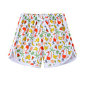 Children's polyester holiday shorts in multiple colours and patterns including stripes, leopard print, and pineapple design.