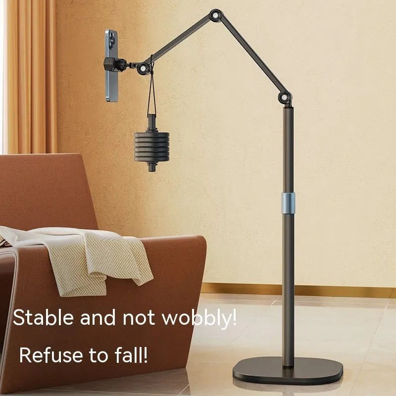 Bedside lifting floor cantilever bracket holding a tablet, with metal chassis and adjustable arm, 56x28x28 cm