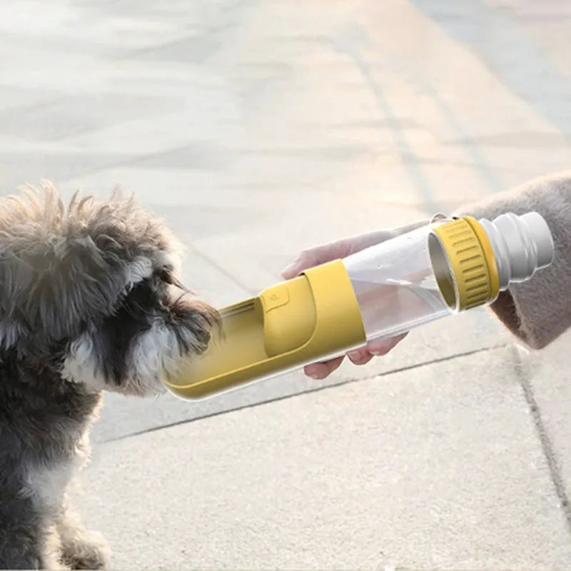 Portable dog water bottle with built-in bowl in dark blue, white, and yellow colour options