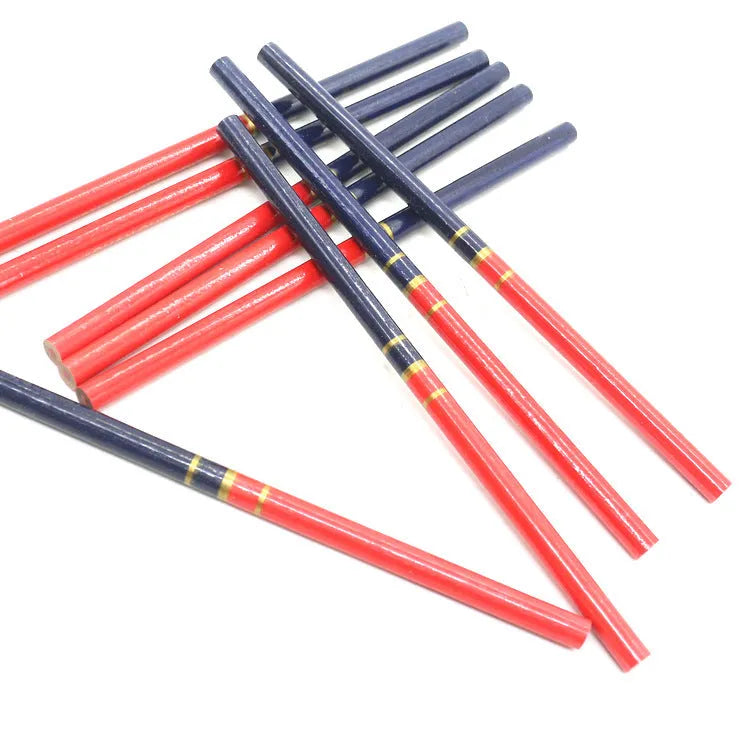 Ten red and blue round wooden carpenter's pencils for construction marking.