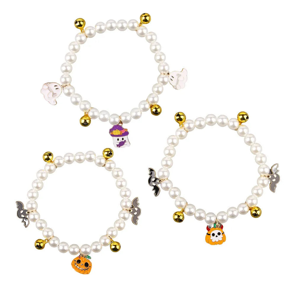 Simulated pearl necklace pet collar decoration with a pumpkin charm for Halloween.