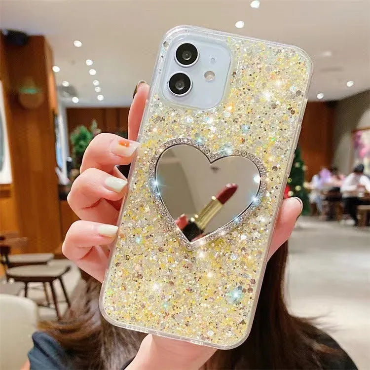 Epoxy mirror heart shape rhinestone phone case in glitter gold for Apple iPhone showing full coverage design