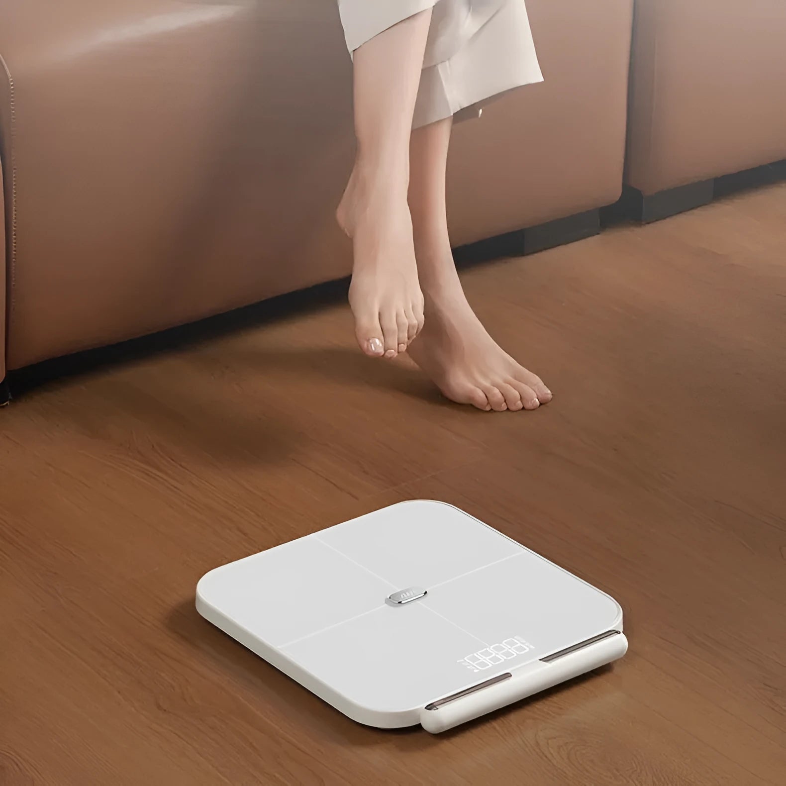 White intelligent body fat scale with eight metal electrodes and a large tempered glass platform.