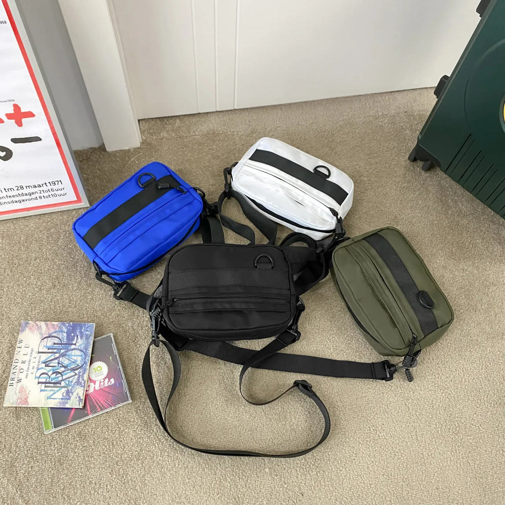 Men's nylon crossbody messenger bag in solid colour with visible sewing thread detail