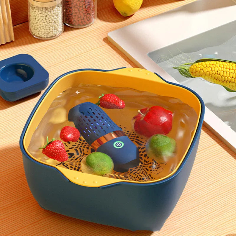 Blue capsule fruit and vegetable purifier with USB charger on a kitchen countertop