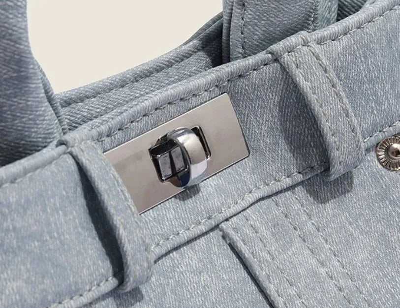 Women's denim blue casual shoulder bag made from soft PU leather with standard size dimensions