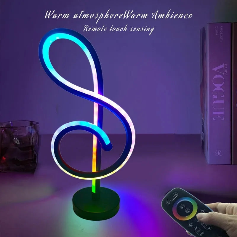 Black musical note shaped Bluetooth RGB lamp with remote control for bedside or sofa lighting.
