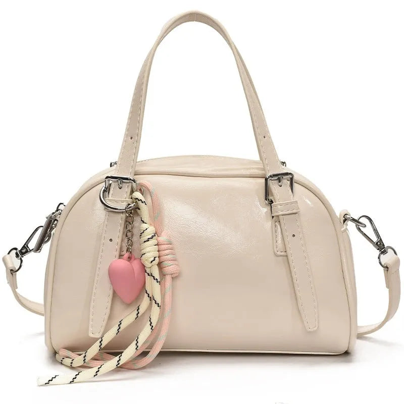 Korean style small square shoulder bag in soft PU leather with shell silhouette
