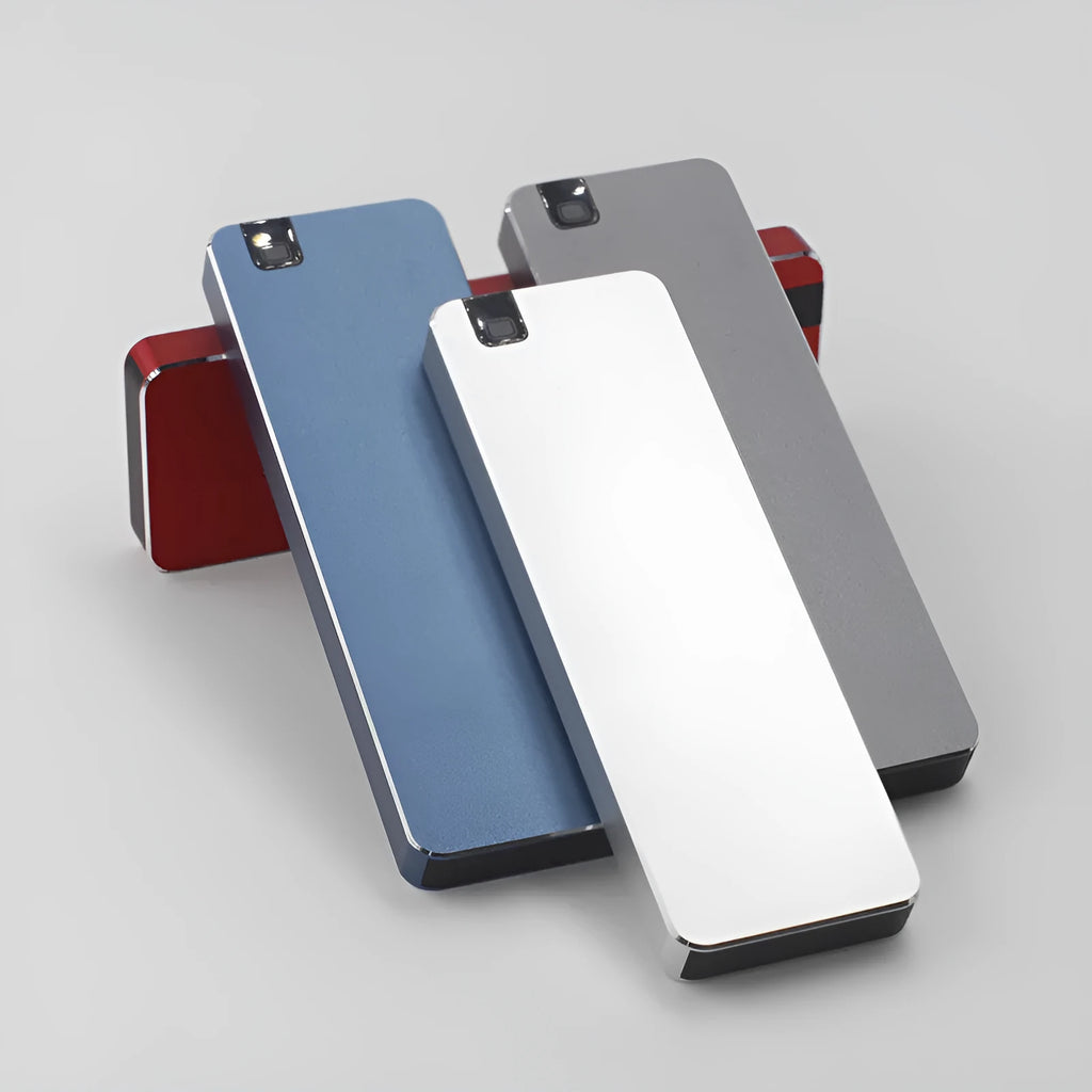 White external solid state drive with metal casing and USB cable, showing compact size for portable storage.
