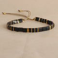 Geometric pull bead bracelet in glass and coloured glaze with round elements