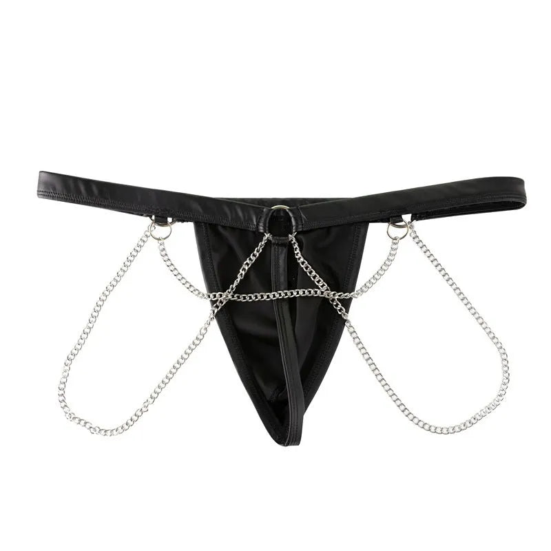 Black patent leather men's thong with a metal chain detail on the back, laid flat.