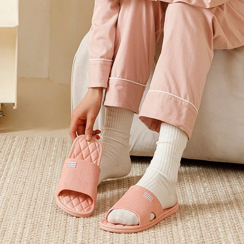 Anti-slip lozenge texture PVC home slippers in solid colours for indoor summer wear