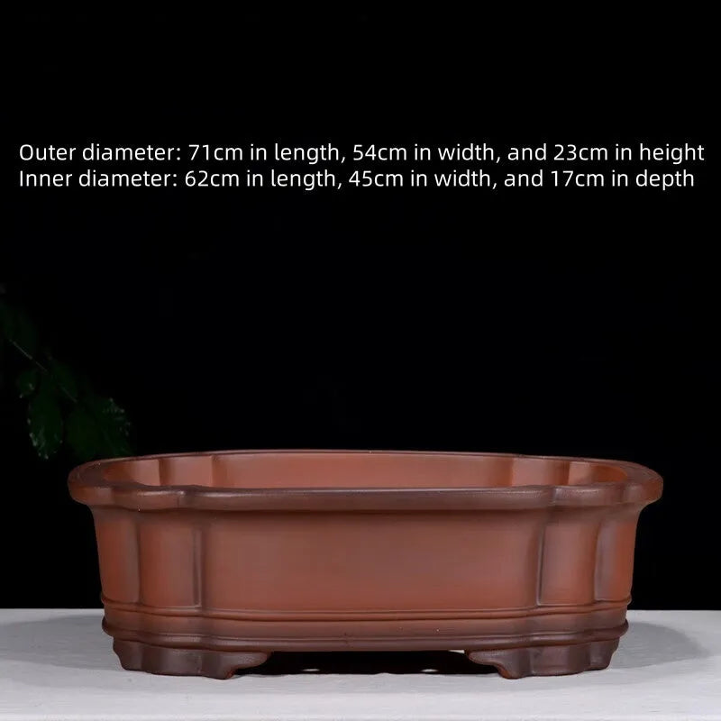 Large Chinese style purple clay flowerpot with antique jade finish and tree stump decoration