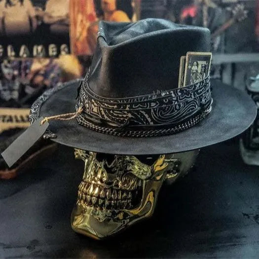 Handmade wool skull hat with a conical crown, shown in its specified colour, laid flat.