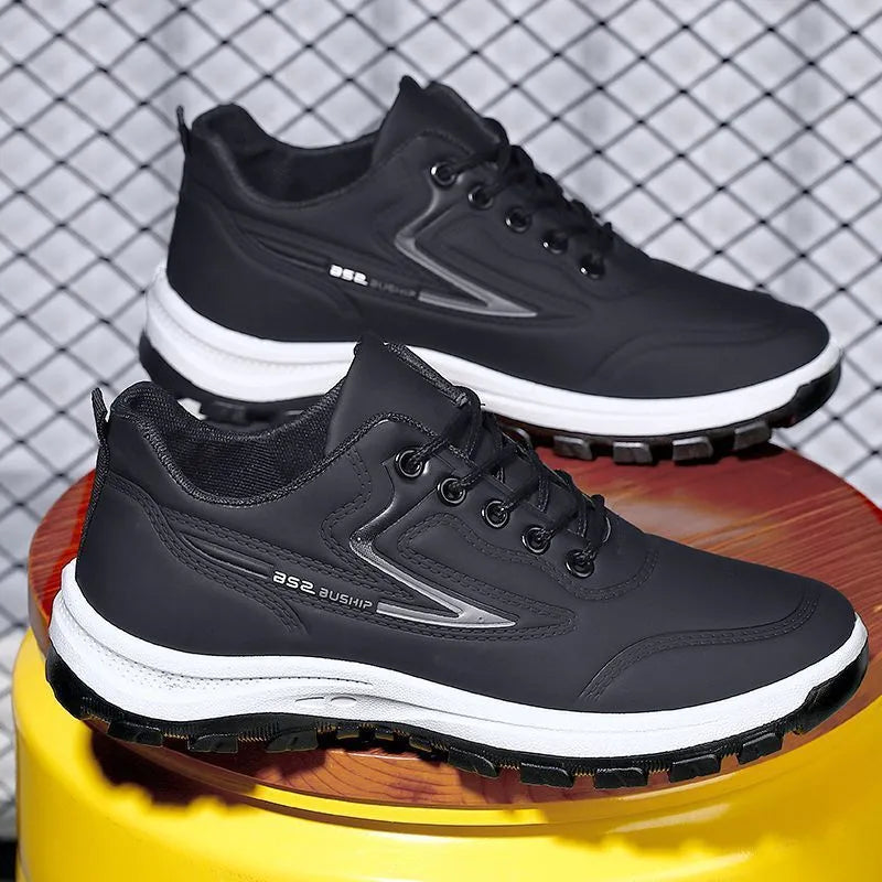 Black and grey waterproof leisure sports shoes with soft plastic soles and pointed-toe design