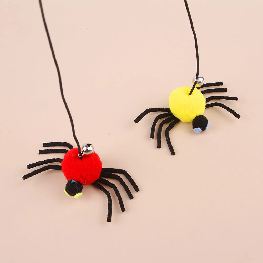 Red and yellow cat hanging door toy with elastic rope, feather stick, bell, and spider attachment.