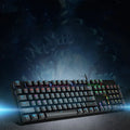 AOC GK410 mechanical keyboard with green axis switches, metal housing, and full 104-key layout including number pad