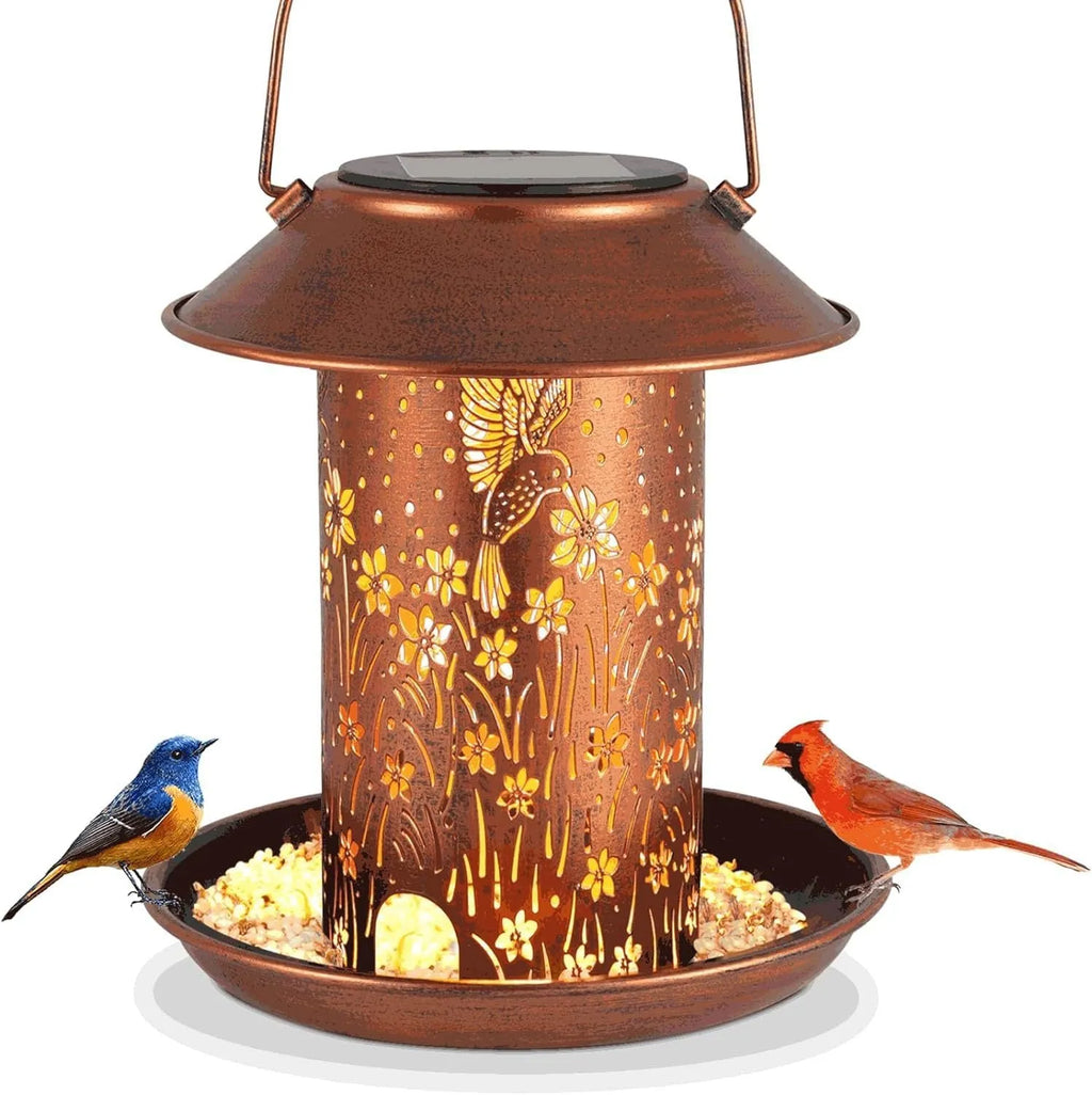 Solar-powered iron art bird feeder with hummingbird pattern, functioning as an outdoor garden lamp.