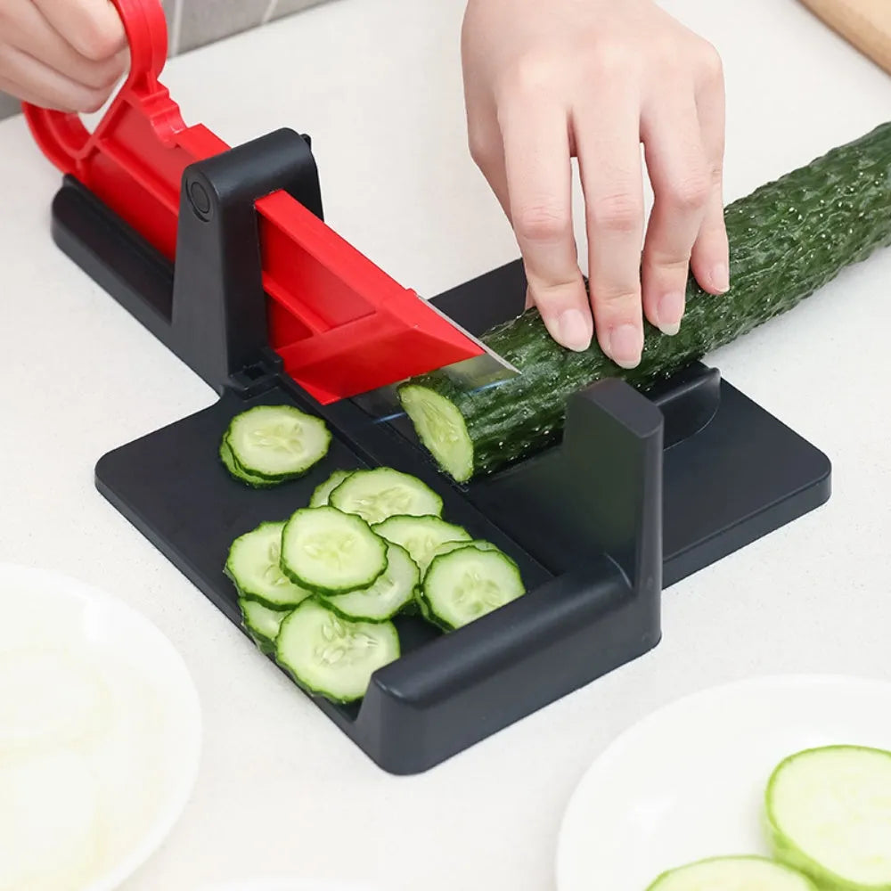 Green kitchen vegetable cutter with stainless steel blades for cutting carrots and potatoes