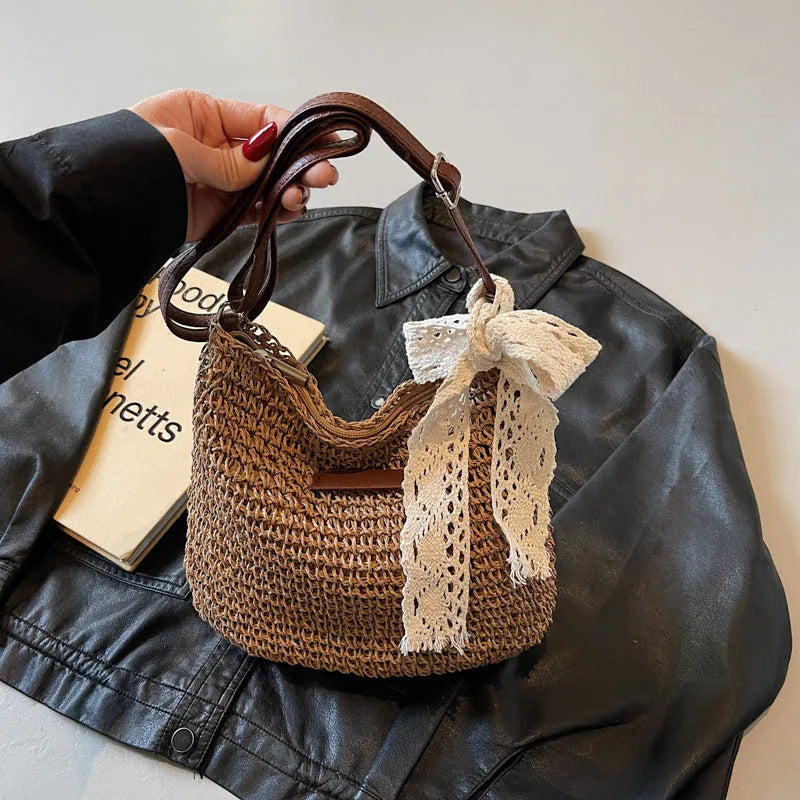 Women's straw woven messenger bag with hollowed design in khaki colour showing square shape