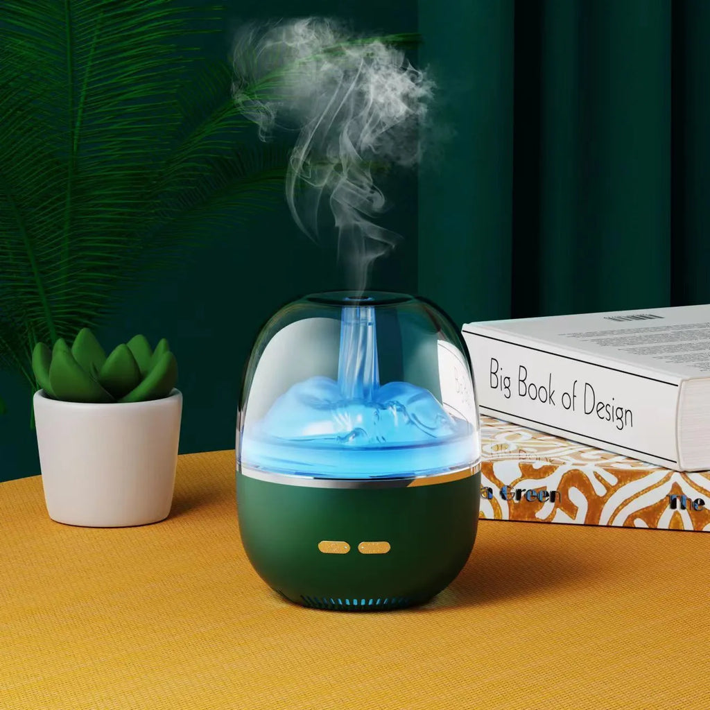 Green ultrasonic humidifier with colourful gradient light on desk showing heavy mist output