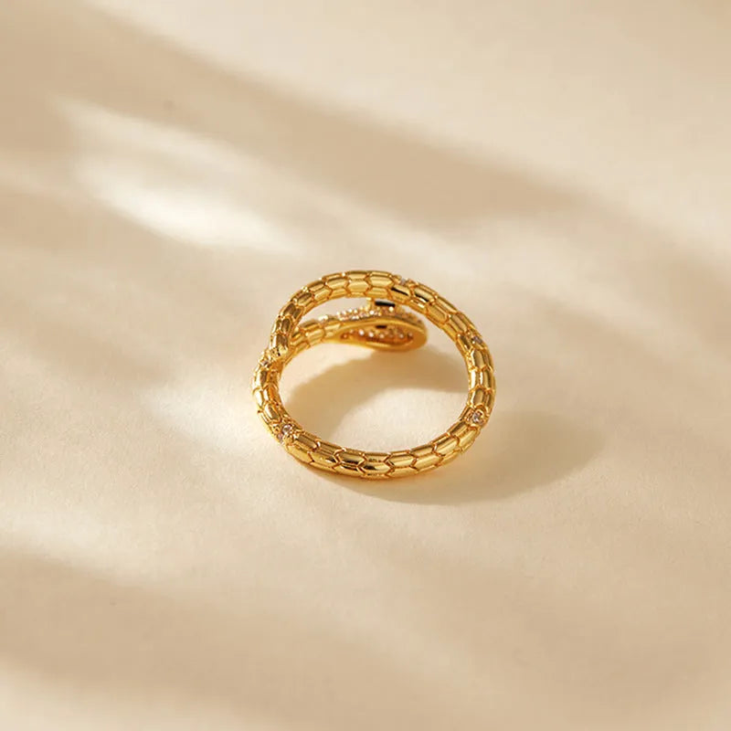 Women's adjustable copper snake ring with 18K gold-colour plating and diamond treatment in KR0201 colour.