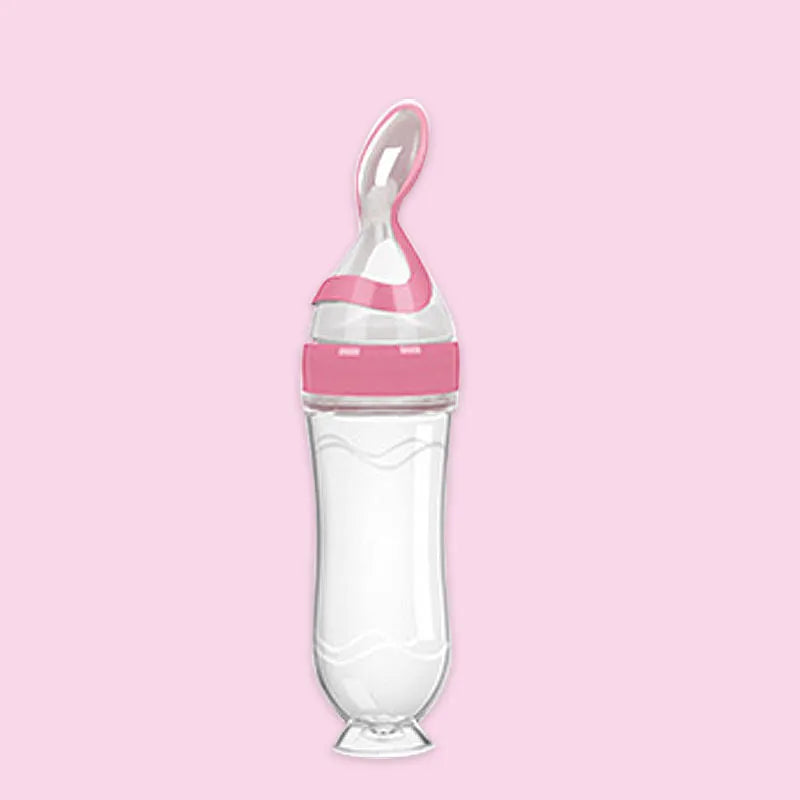Silicone baby rice paste feeding bottle with suction cup base in blue, green, pink, white, or yellow.