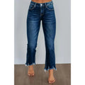Women's dark blue denim jeans with hand-worn distressing detail on a hanger.
