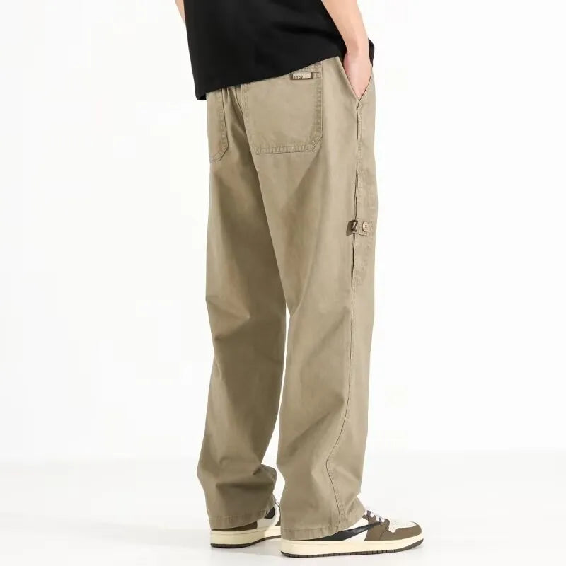 Women's loose wide-leg polyester blend trousers in black, mid-waist drawstring elastic waist, flat lay
