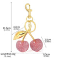 Red zinc alloy cherry key ring pendant with three-dimensional design