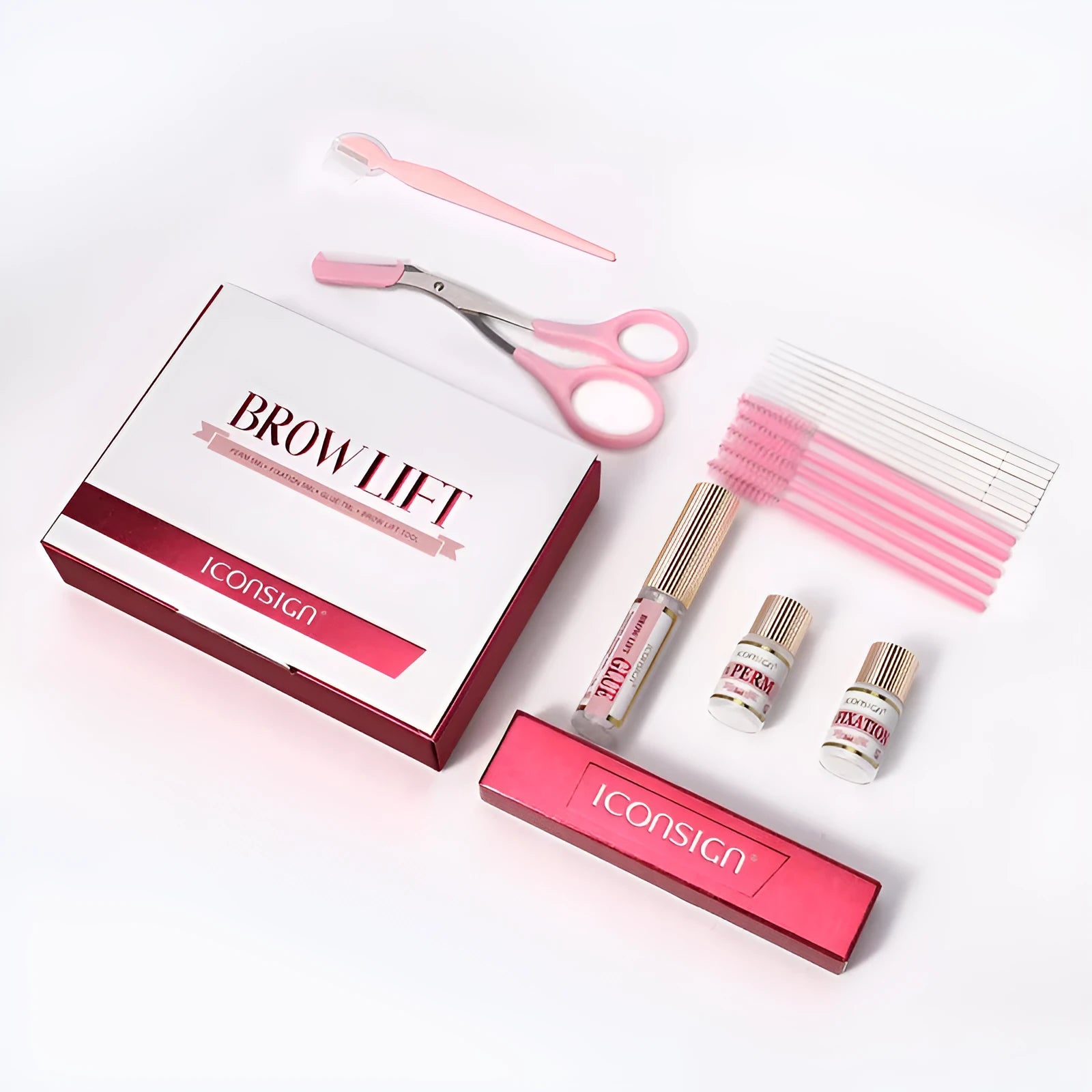 Pink eyebrow perm set with ironing tools for brow straightening and keratin styling treatments