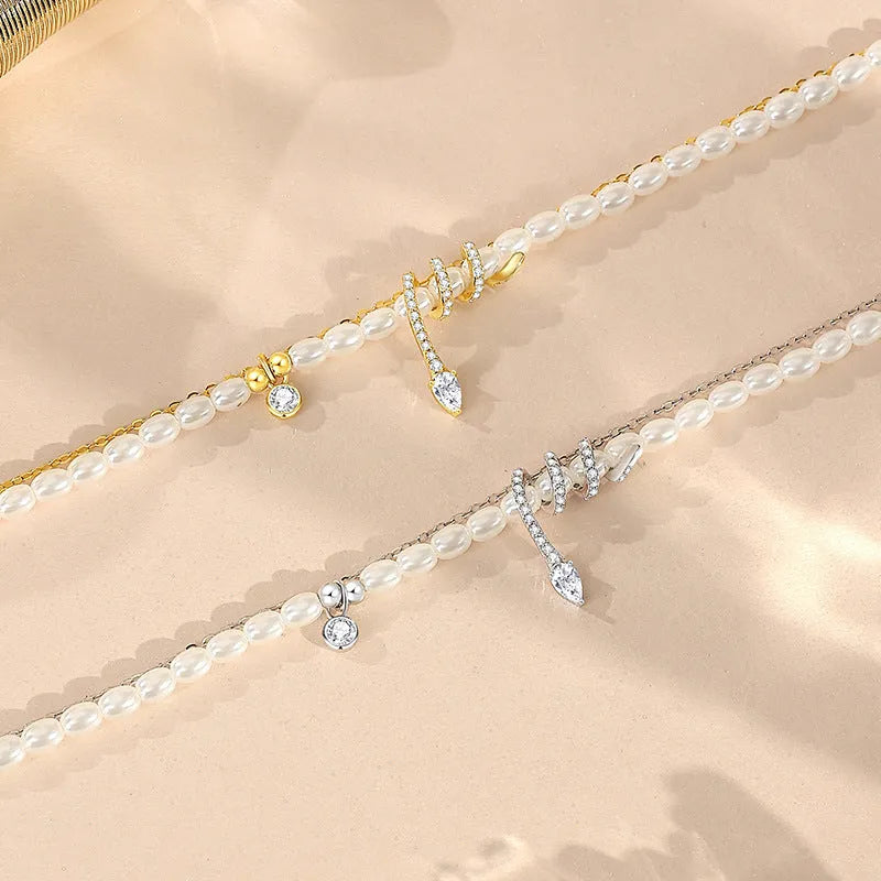 Pearl snake 925 sterling silver bracelet with geometric design in gold or white gold finish.