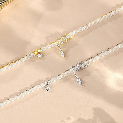 Pearl snake 925 sterling silver bracelet with geometric design in gold or white gold finish.