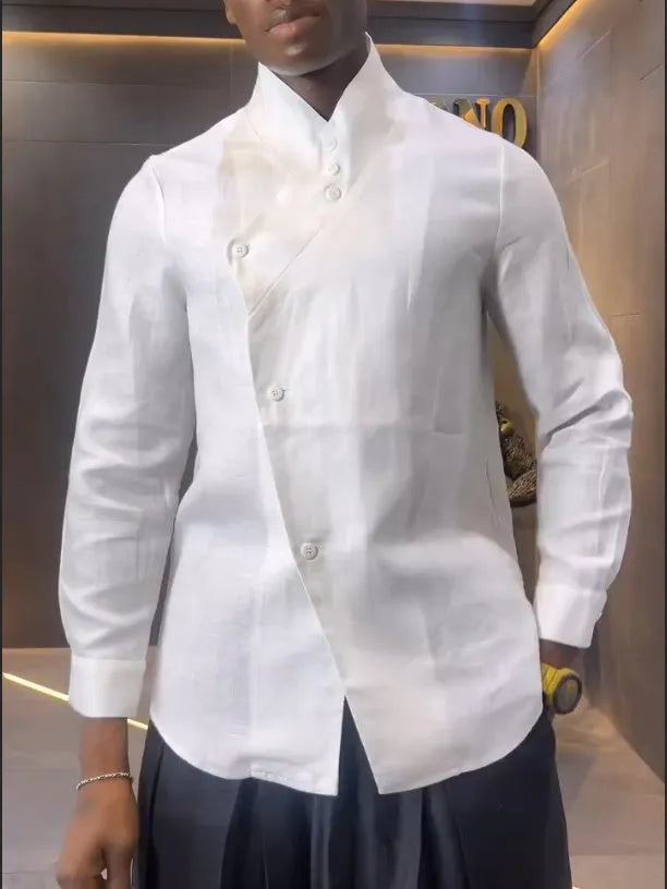 White asymmetric front long sleeve shirt paired with black pleated pants in a women's casual co-ord set.