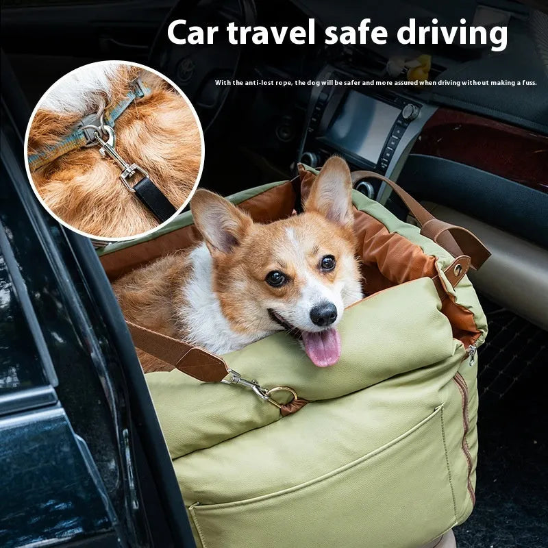 Brown cloth portable cat car kennel with mesh windows, shown on a car seat.