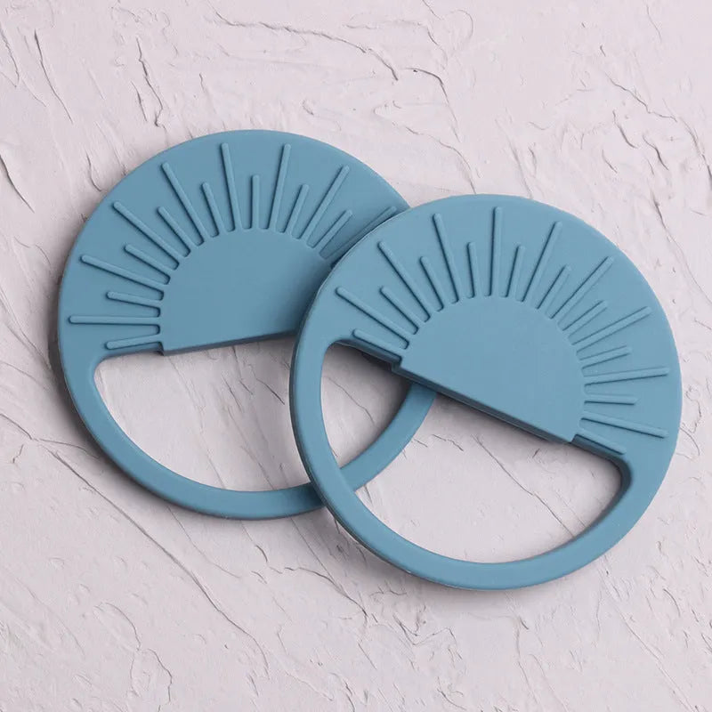 Silicone baby teether toy in multiple colours including pink and yellow, 88x88mm for infant teething relief