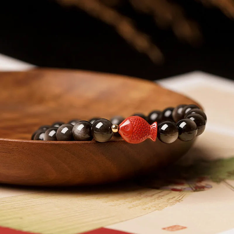 Natural obsidian and cinnabar round bead bracelet shown in 6mm, 8mm, and 10mm size options.