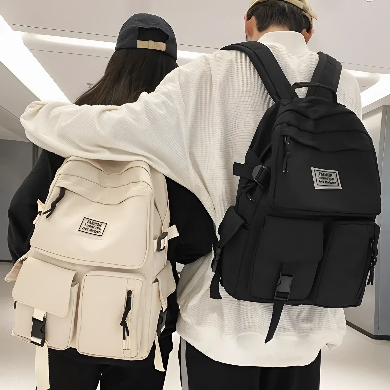 Soft nylon student backpack in black colour with computer compartment and three-dimensional pockets