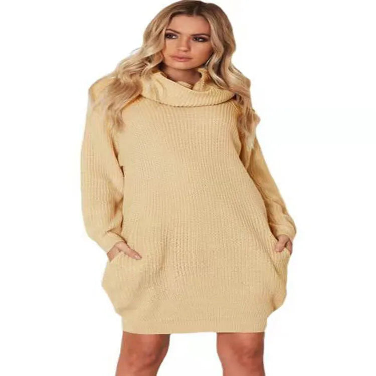 Light apricot coloured mid-length pullover sweater with a lapel collar and side pockets on a model.