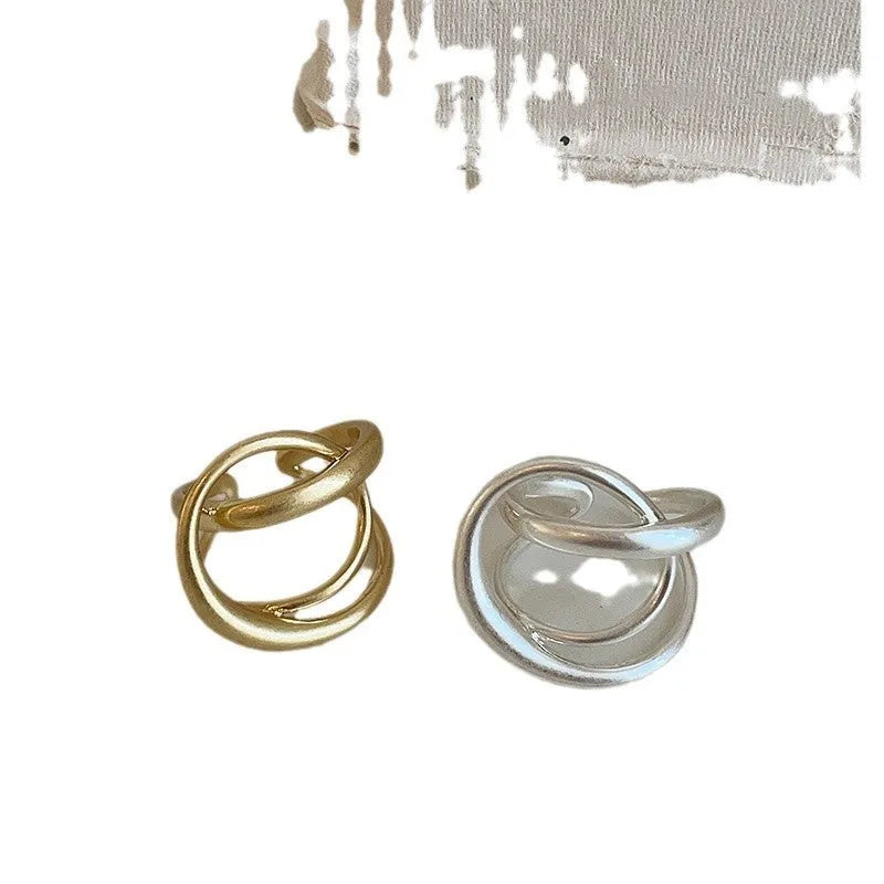 Three-dimensional interlaced geometric adjustable ring with matte metal finish and real gold electroplating