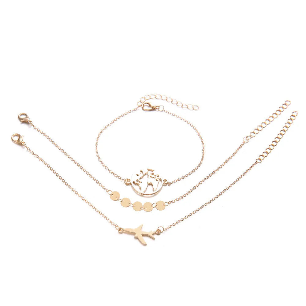 Set of three women's bohemian-style bracelets with alloy heart charms featuring detailed aircraft map designs.
