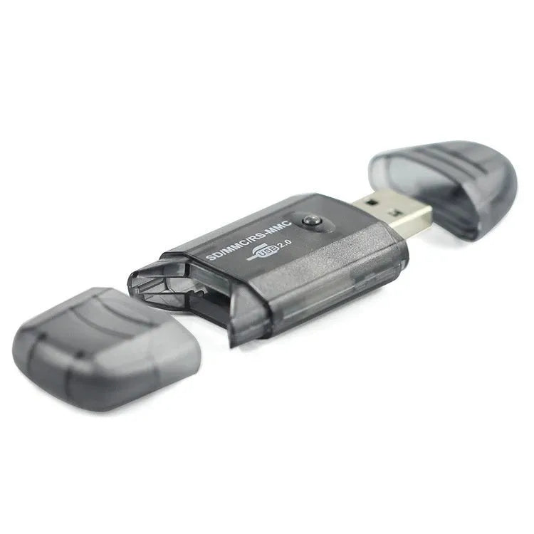 Transparent plastic USB card reader with LED light and memory card inserted, next to its card holder.