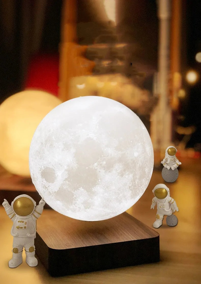 Maglev floating planet night light with three astronaut figurines and USB cable