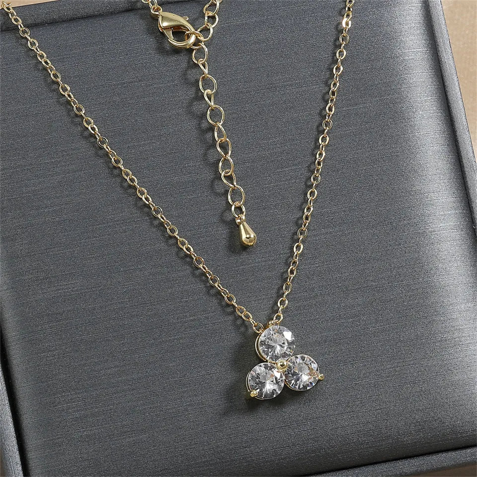 Tassel long necklace with electroplated copper water wave chain and round alloy pendant
