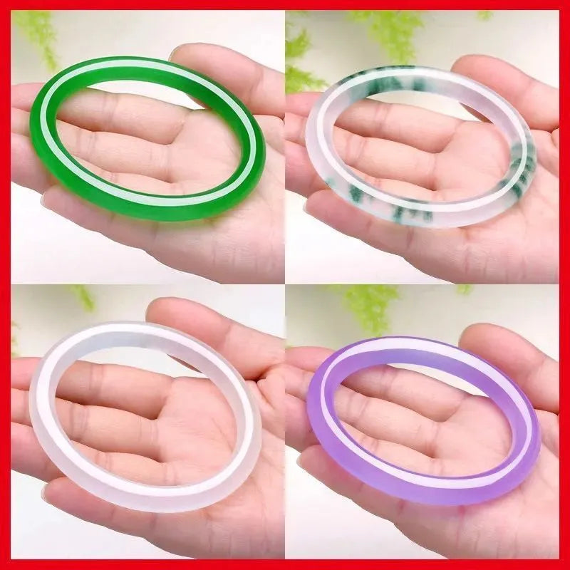 Jade bracelet with floating flower design and auspicious cloud patterns in green colour