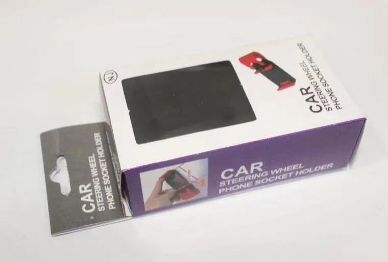 Black ABS plastic car steering wheel phone holder showing mounting position
