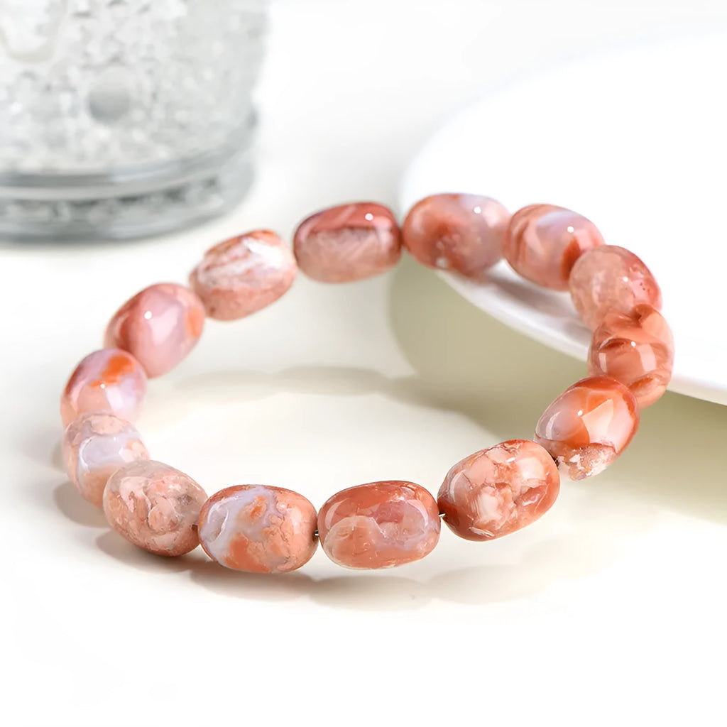 Natural cherry agate barrel bead bracelet with geometric 10x14mm beads and ruyi design